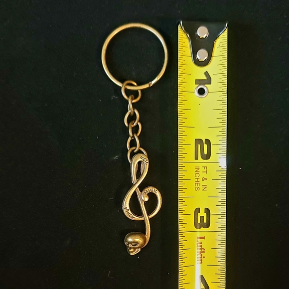 Brass Alloy Treble Clef Music Note With Skull Key Chain - Picture 3 of 3